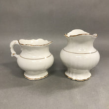 Load image into Gallery viewer, Crown Potteries Co. Golden Trimmed Cream and Sugar
