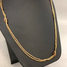 Load image into Gallery viewer, Avon Goldtone Knot Necklace
