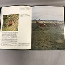 Load image into Gallery viewer, Journey Through Tanzania Book
