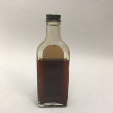 Load image into Gallery viewer, Antique MK Cocoanut Nectar 2oz Glass Bottle w Contents (5.5&quot;)
