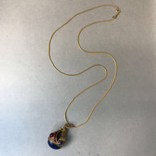 Load image into Gallery viewer, Vintage Avon Goldtone Faux Lapis Bejeweled Pendant
