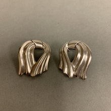 Load image into Gallery viewer, Vintage Monet Draped Ribbon Silvertone Earrings
