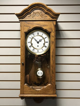 Load image into Gallery viewer, Howard Miller Oak Triple-Chime Wall Clock #612-578 (~32&quot;)
